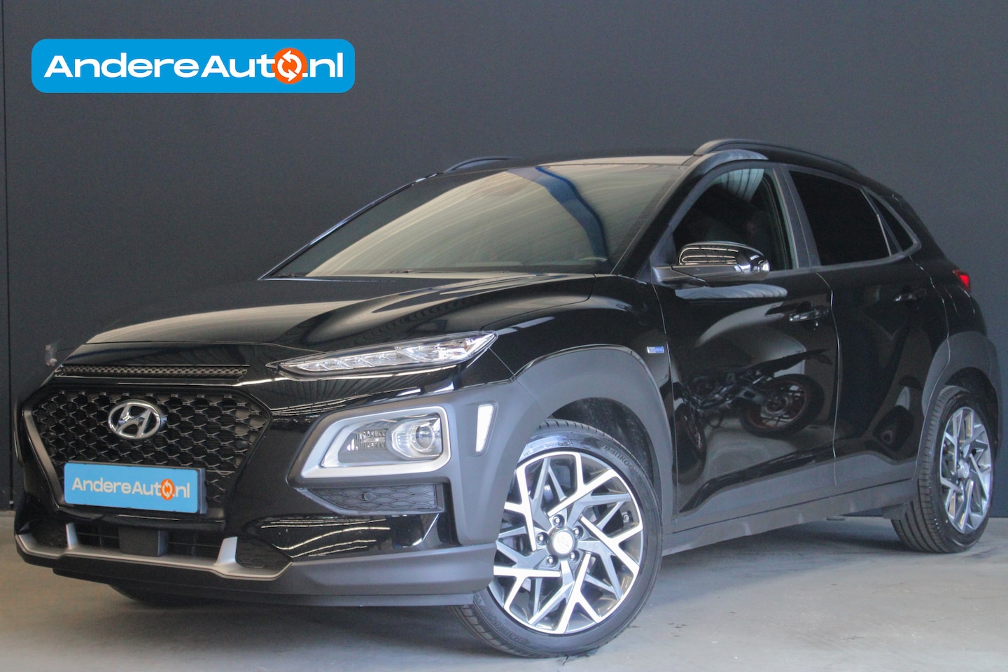 Hyundai Kona - 1.6 GDI HEV Premium |dealer onderhouden|HUD|stoel/stuurverwarming|camera| - AutoWereld.nl
