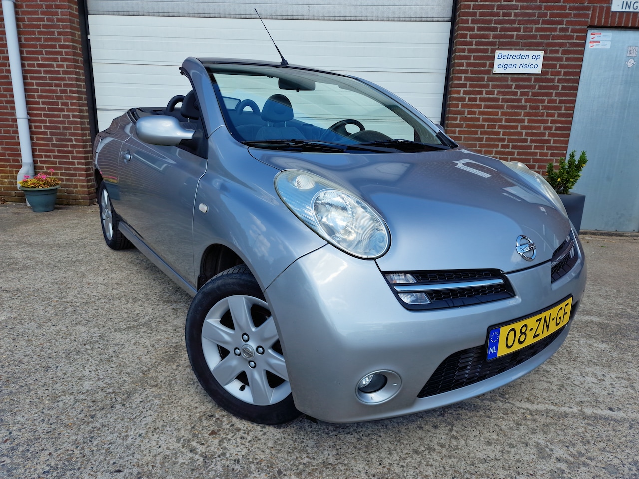 Nissan Micra C+C - 1.6 Tekna In nette staat  verkerende Nissan Micra  C+C cabrio,  Bjr 2008,  64953 km, nieuwe apk bij - AutoWereld.nl