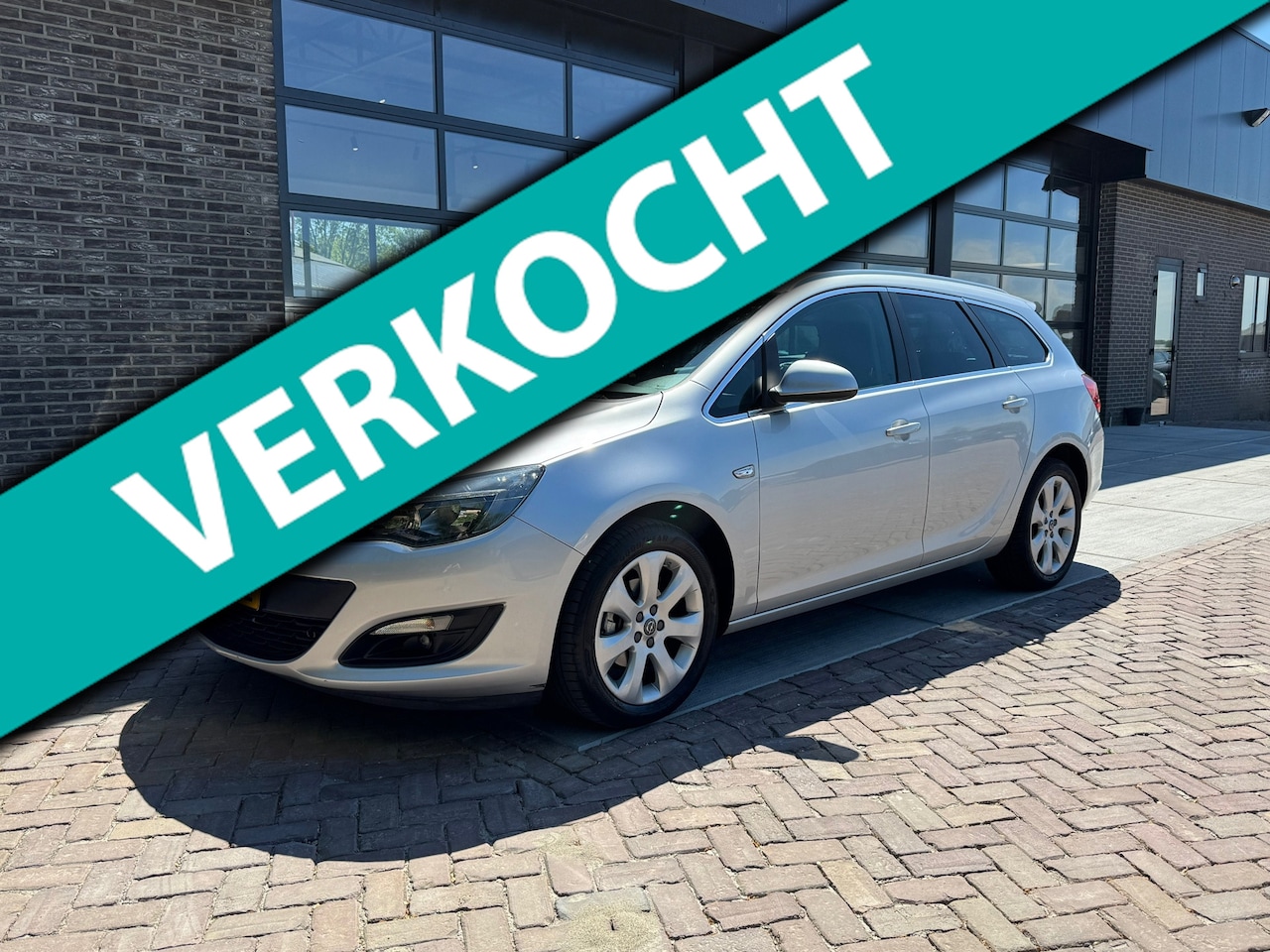 Opel Astra Sports Tourer - 1.4 Turbo Business + | Trekhaak | Navi | Clima | Cruise | - AutoWereld.nl