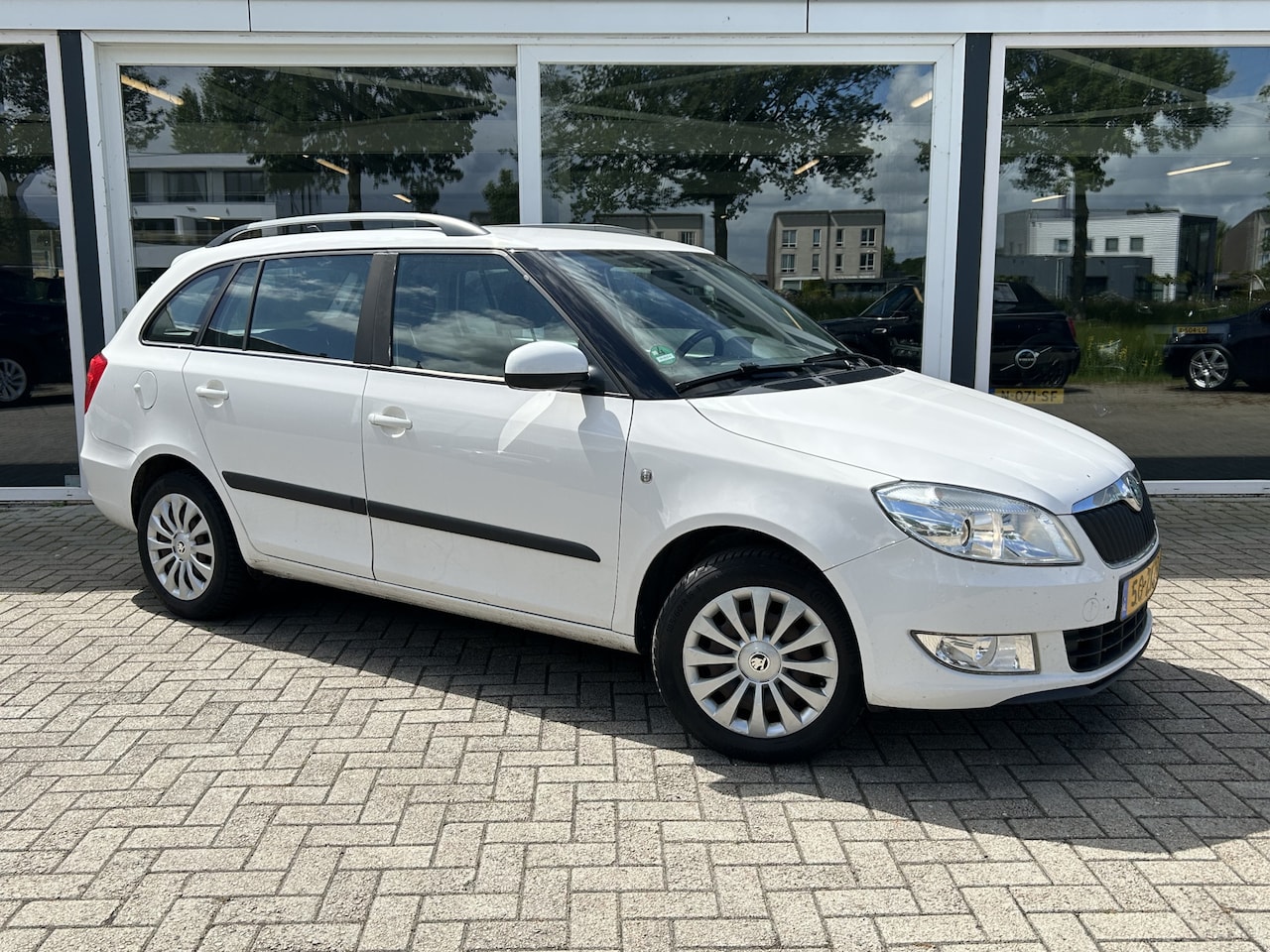 Skoda Fabia Combi - 1.2 TDI Greenline Businessline Cruise / Airco / Navi / PDC - AutoWereld.nl