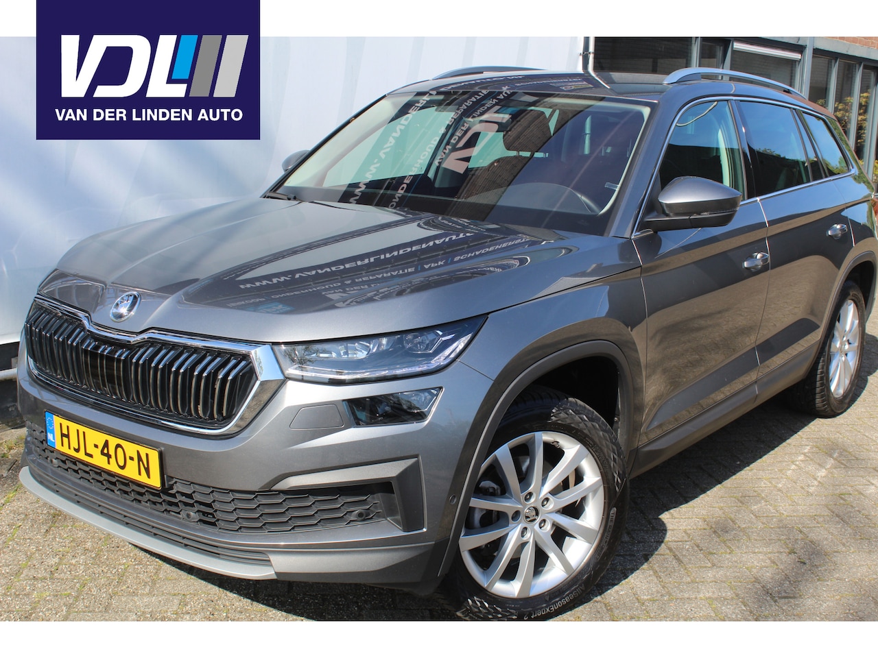 Skoda Kodiaq - 1.5 TSI Sportline Business 7p. Airco l Cruise control l Navigatie l AppleCarPlay/AndroidAu - AutoWereld.nl