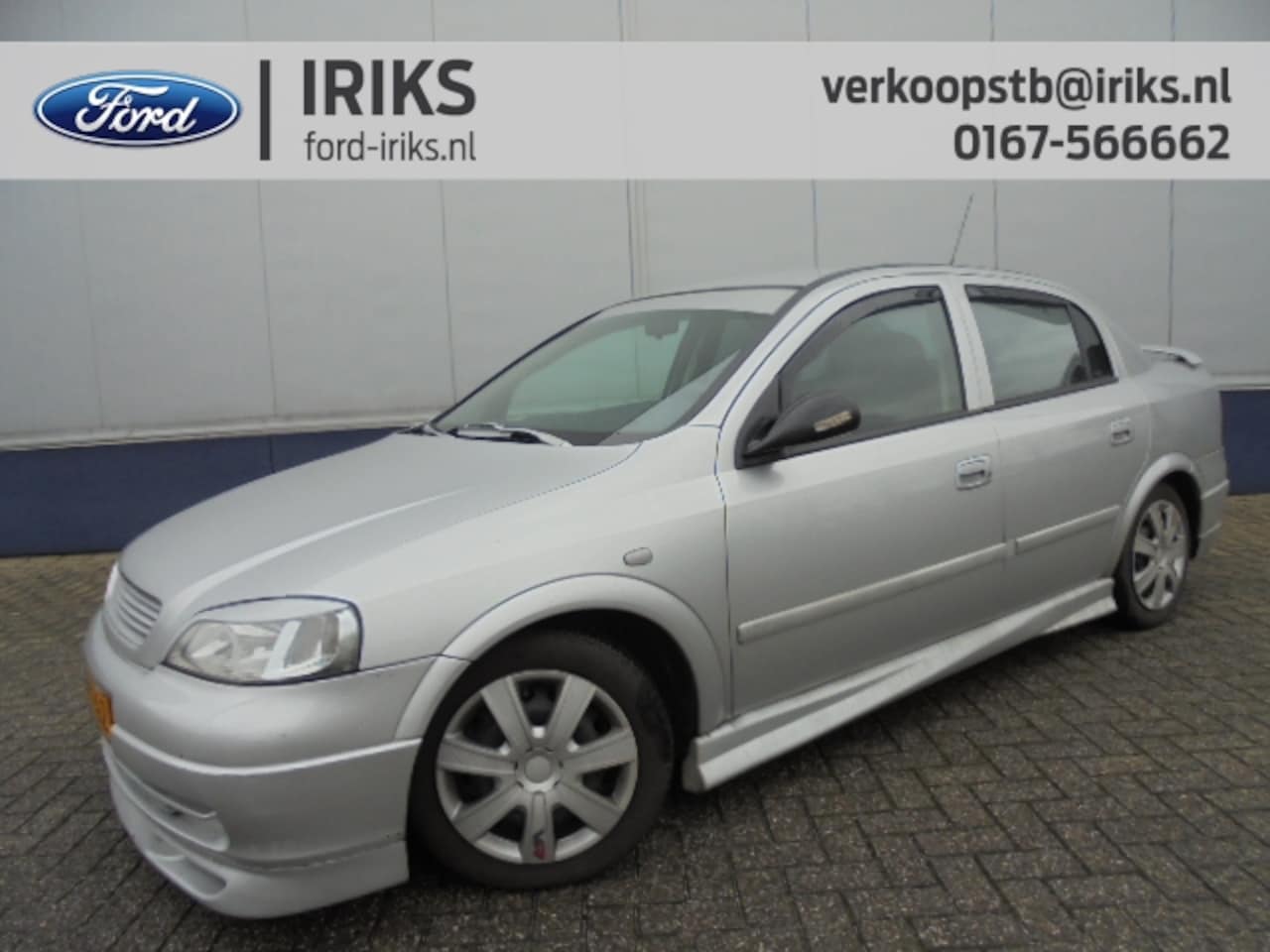 Opel Astra - 1.6 I SDN Pearl Spoiler Pakket / meeneemprijs, - AutoWereld.nl
