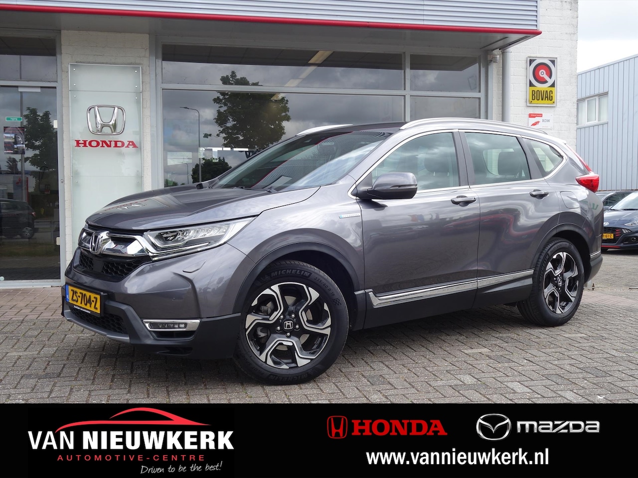 Honda CR-V - 2.0 HYBRID 184pk Automaat Elegance | Trekhaak | Navi | Camera - AutoWereld.nl