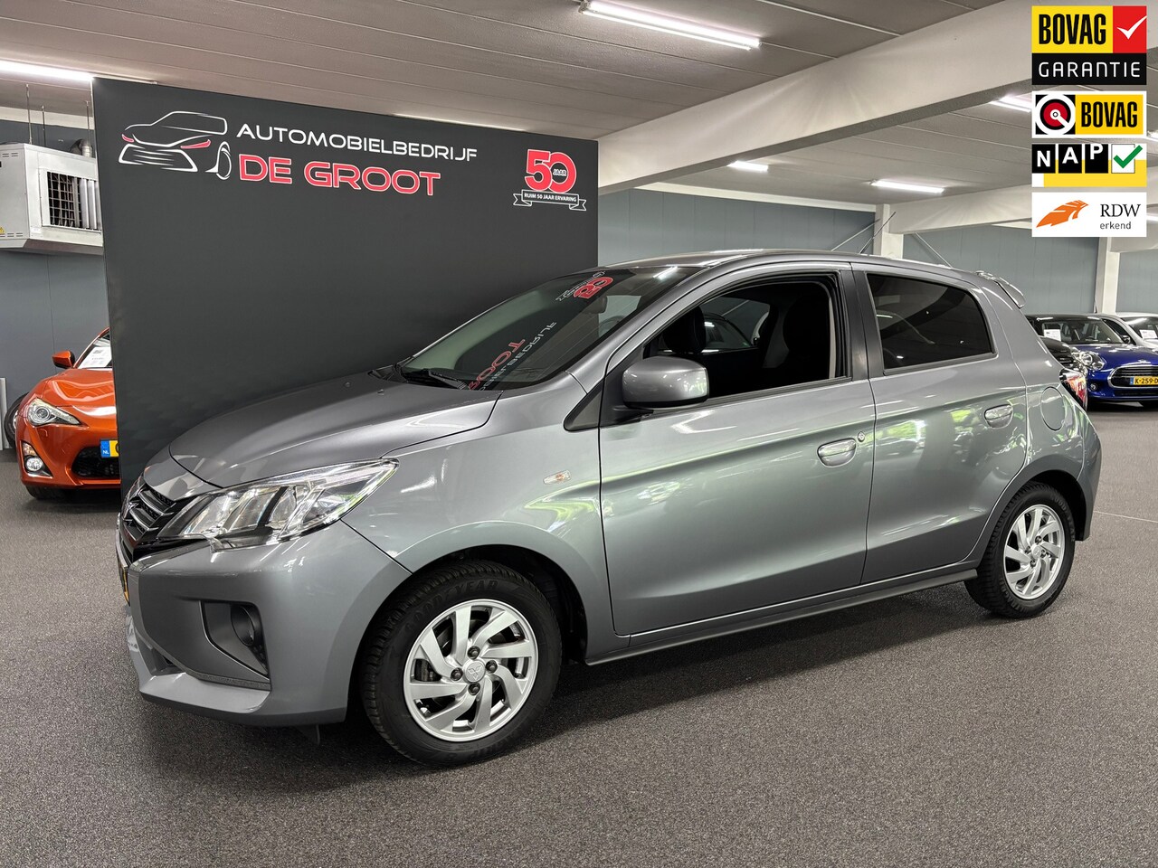 Mitsubishi Space Star - 1.2 Intense / NL-auto, Automaat, Navi, Stoelverwarming, Camera - AutoWereld.nl