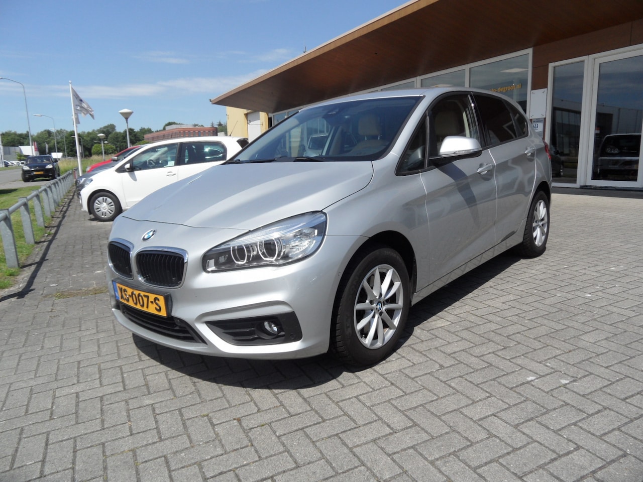BMW 2-serie Active Tourer - 218i High Executive Automaat /Trek afn kogel/Stoelverwarming - AutoWereld.nl