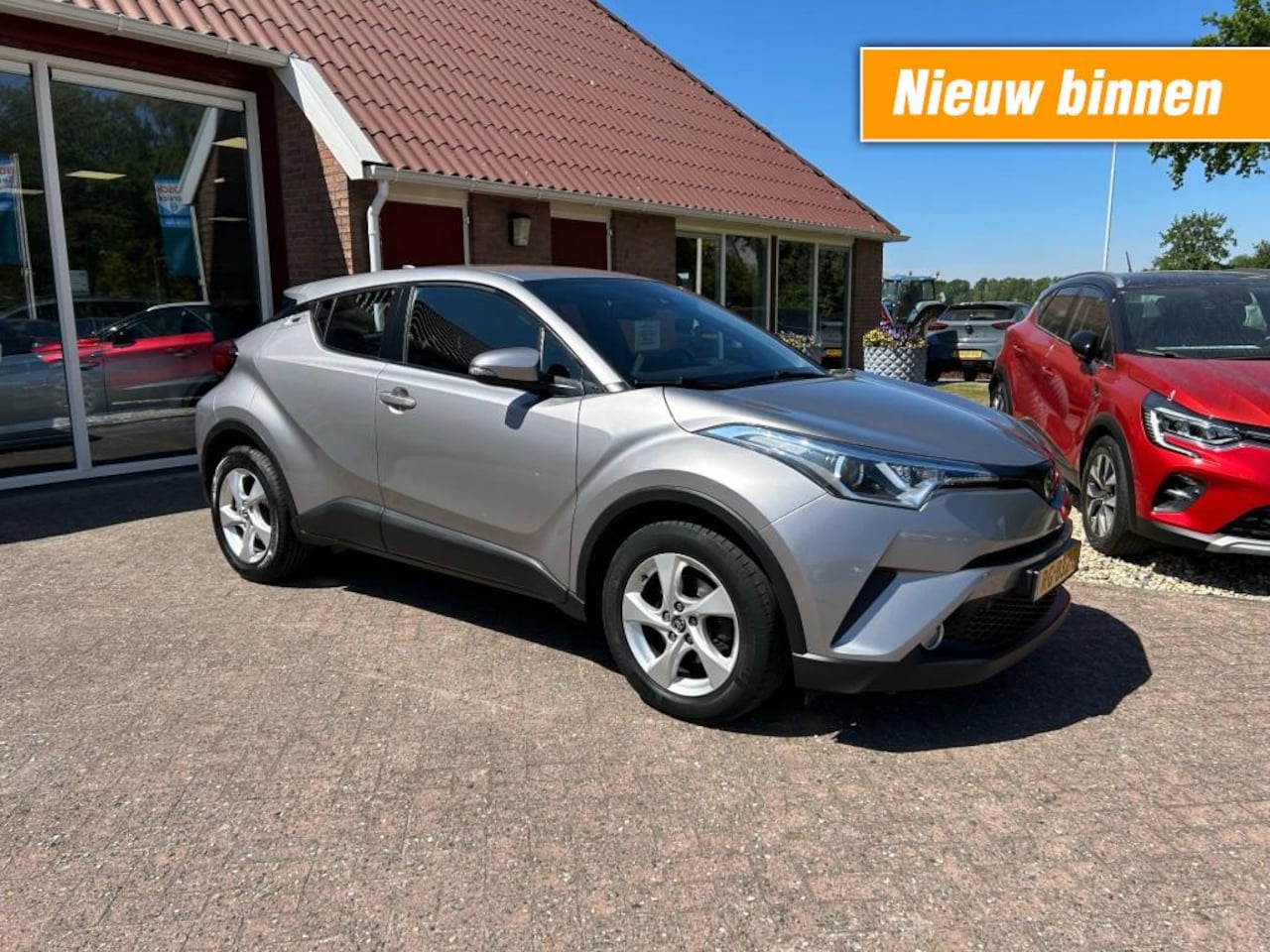 Toyota C-HR - 1.2 DYNAMIC AUTOMAAT TREKHAAK/NAVIGATIE/CRUISE/ENZ. - AutoWereld.nl
