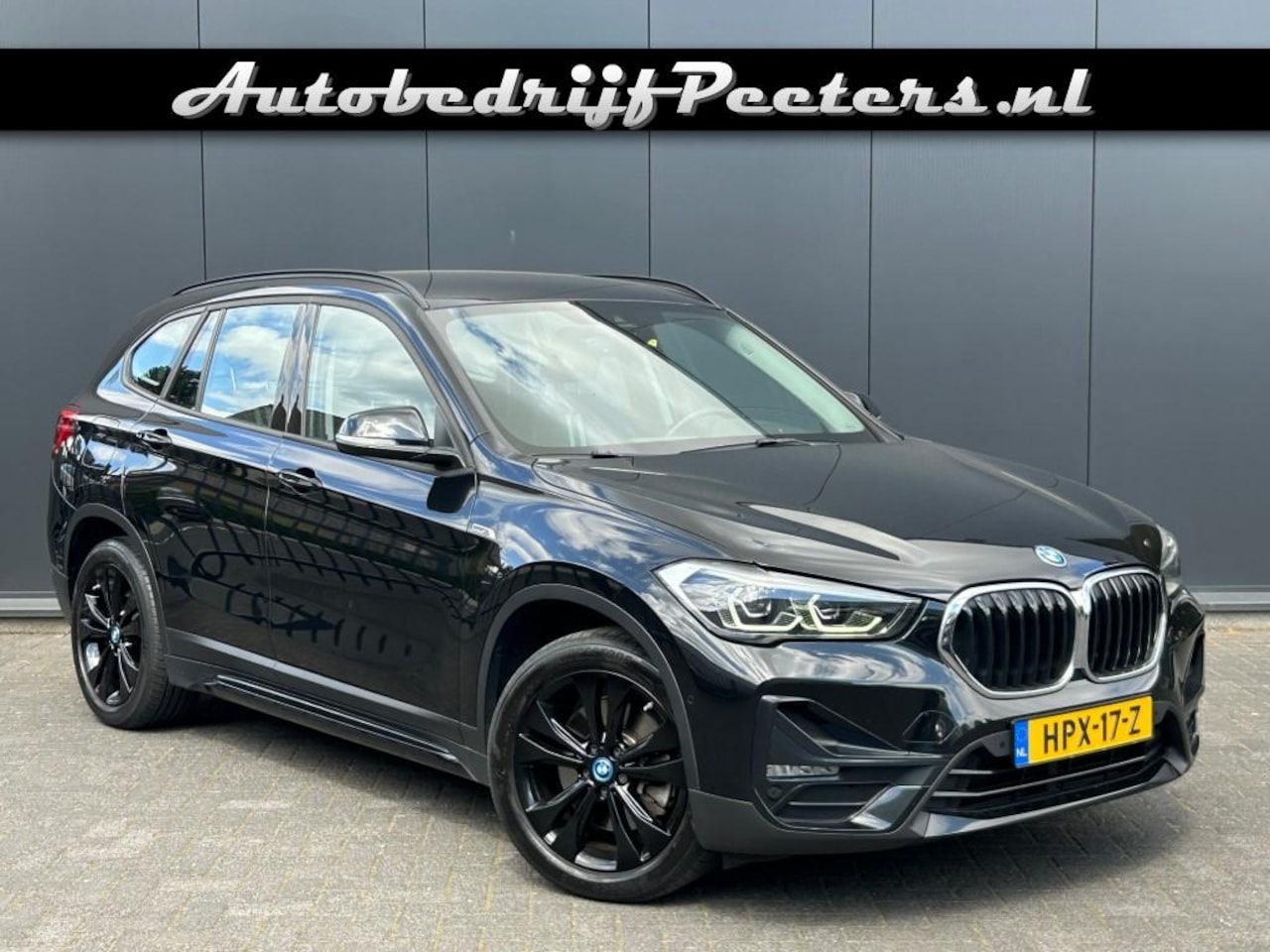 BMW X1 - xDrive25e Sport Line Navi LED E.klep Cruise PDC - AutoWereld.nl