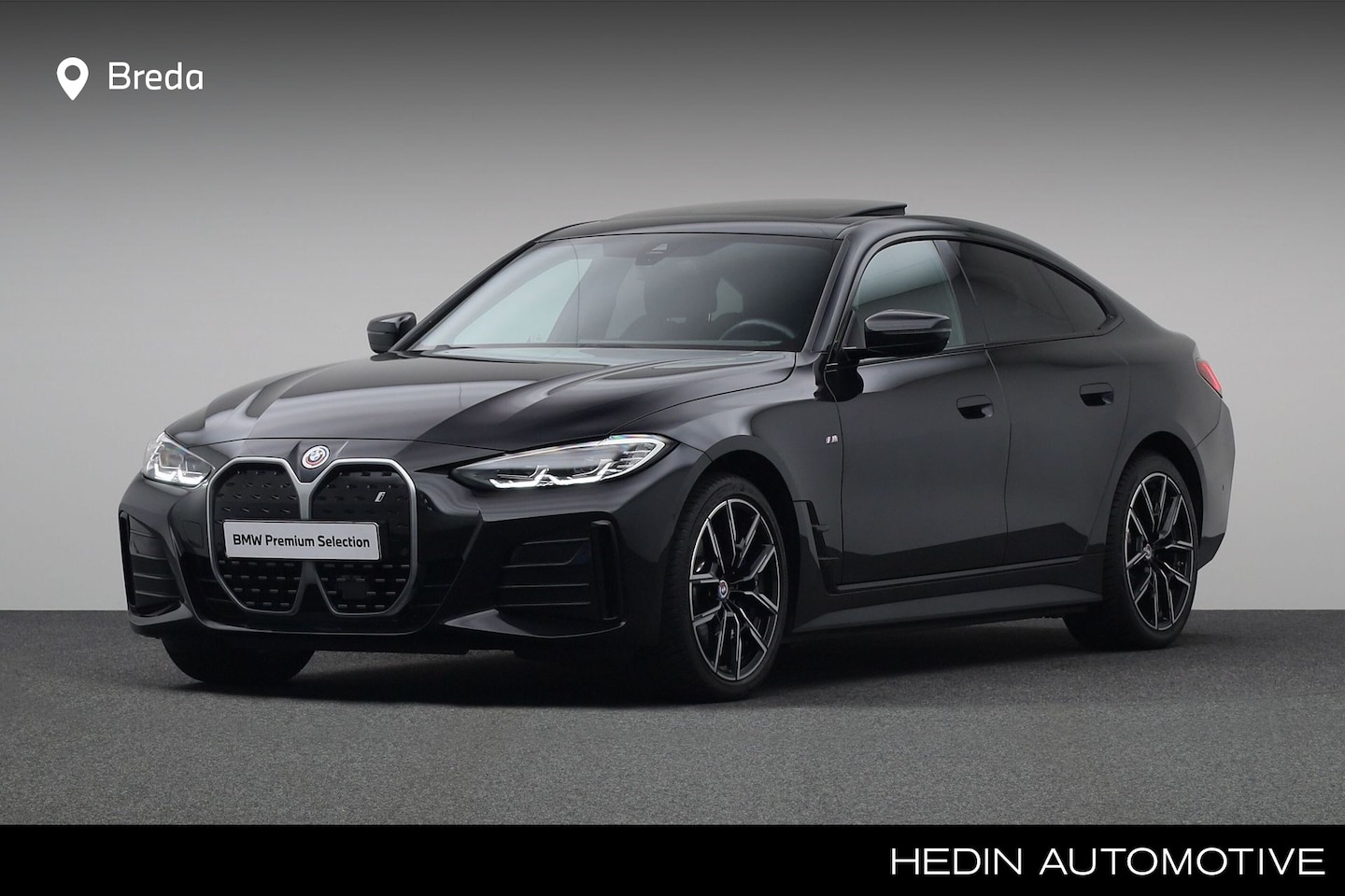 BMW i4 - eDrive40 84 kWh | M-sport Shadow Line | Parkeerhulpsysteem | Adaptief M onderstel | HiFi | - AutoWereld.nl