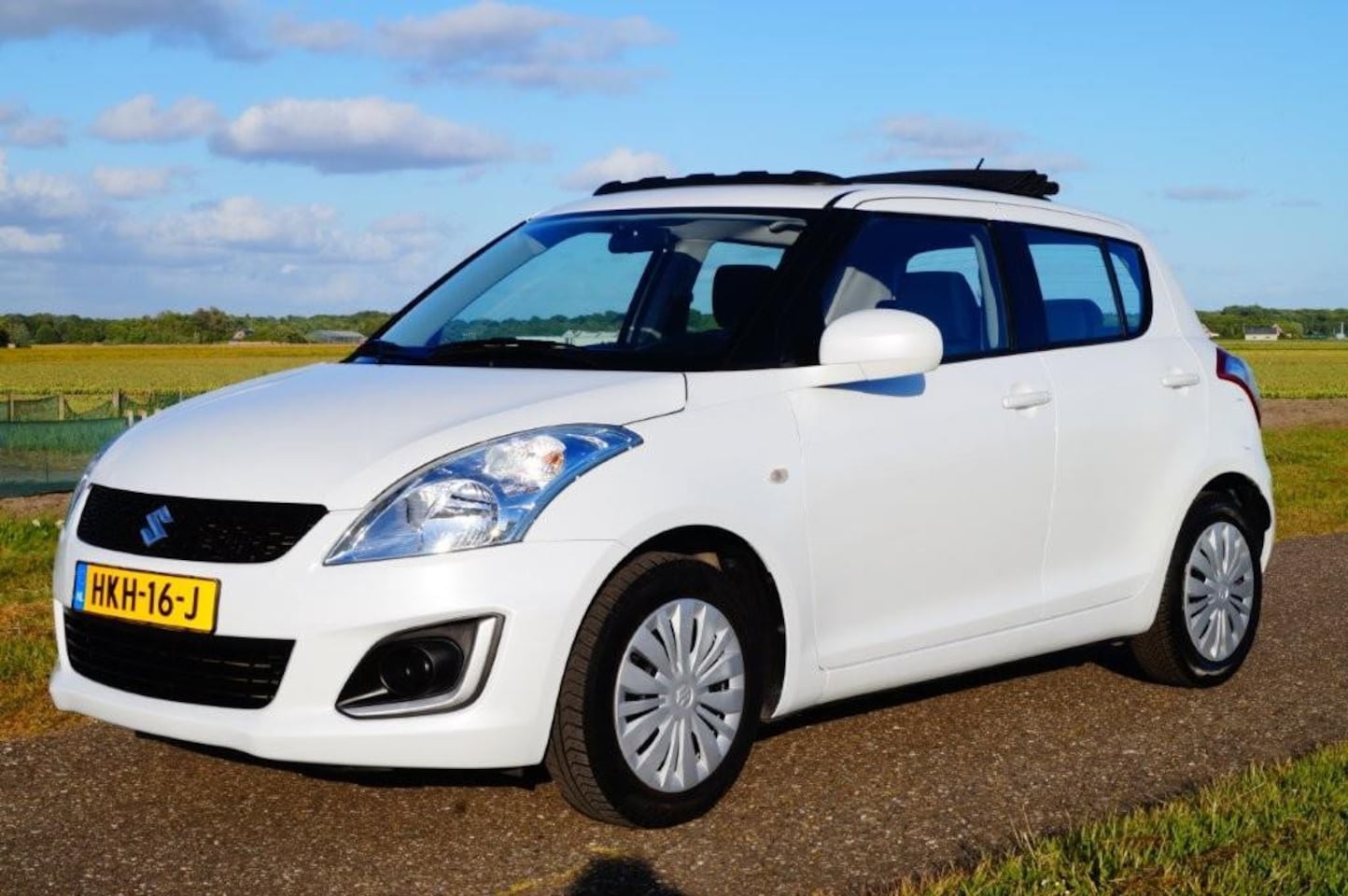 Suzuki Swift - 1.2 Comfort Air elektr.cabrio dak - AutoWereld.nl