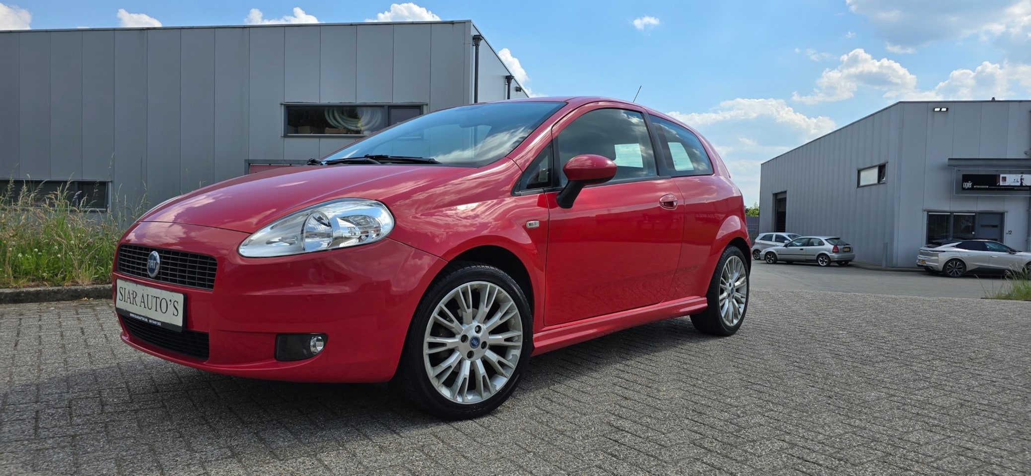 Fiat Grande Punto - 1.4-16V Sport Airco,Leer,dealer onderhouden! - AutoWereld.nl