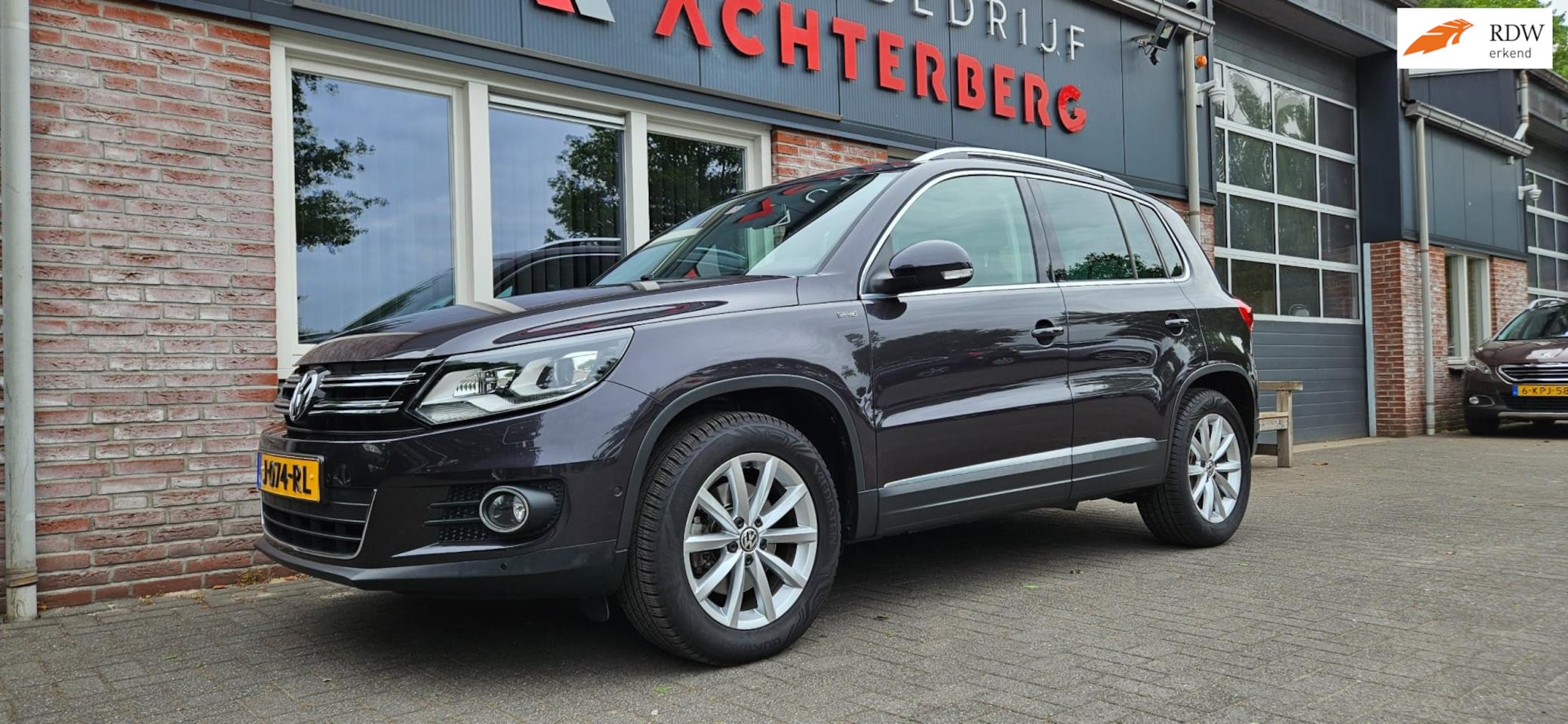 Volkswagen Tiguan - 1.4 TSI Sport&Style Trekhaak! Xenon! Mooie/Nette Auto! Airco/Clima! Cruise Control! - AutoWereld.nl