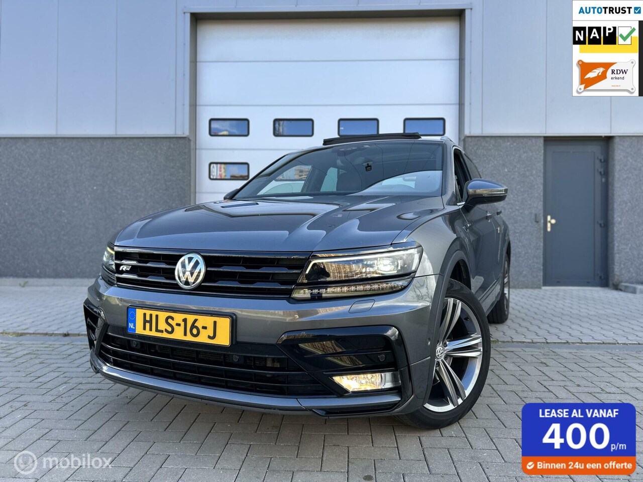 Volkswagen Tiguan - 2.0 TDI 4Motion R-LINE/240PK/PANO/DSG/ - AutoWereld.nl