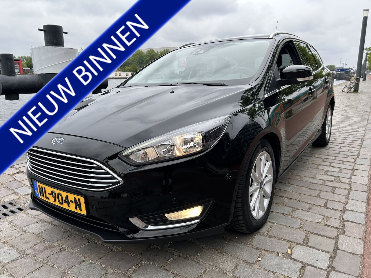 Ford Focus Wagon - 1.5 Titanium Automaat airco/ecc navi/camera apk - AutoWereld.nl
