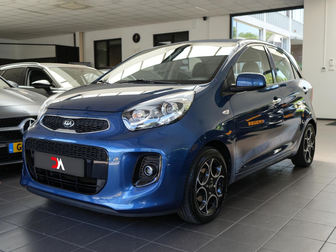 Kia Picanto - 1.2 CVVT DynamicLine | NAP | SENSOREN | CLIMA | LED | CRUISE | SPORTLINE - AutoWereld.nl