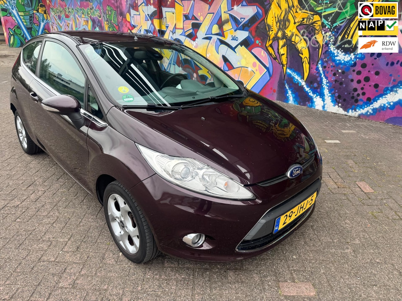 Ford Fiesta - 1.4 Titanium airco sport velgen stereo zeer leuke auto rijd heerlijk veel opties Bouwjaar - AutoWereld.nl