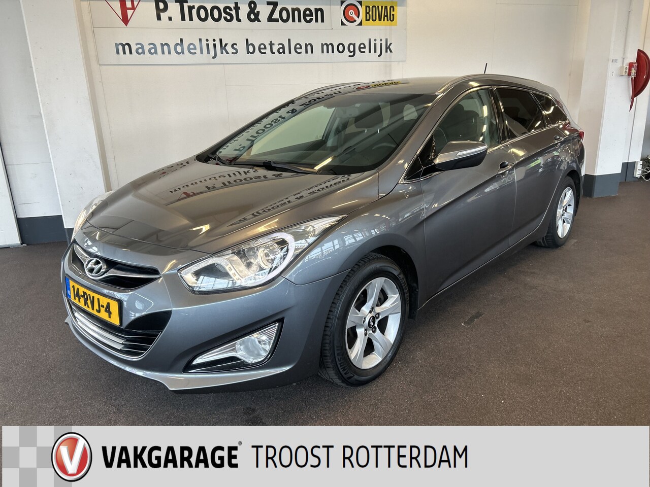 Hyundai i40 Wagon - 1.6 GDI Blue i-Vision | Cruise control | Climate control | Trekhaak | Navigatie | Elek. ve - AutoWereld.nl