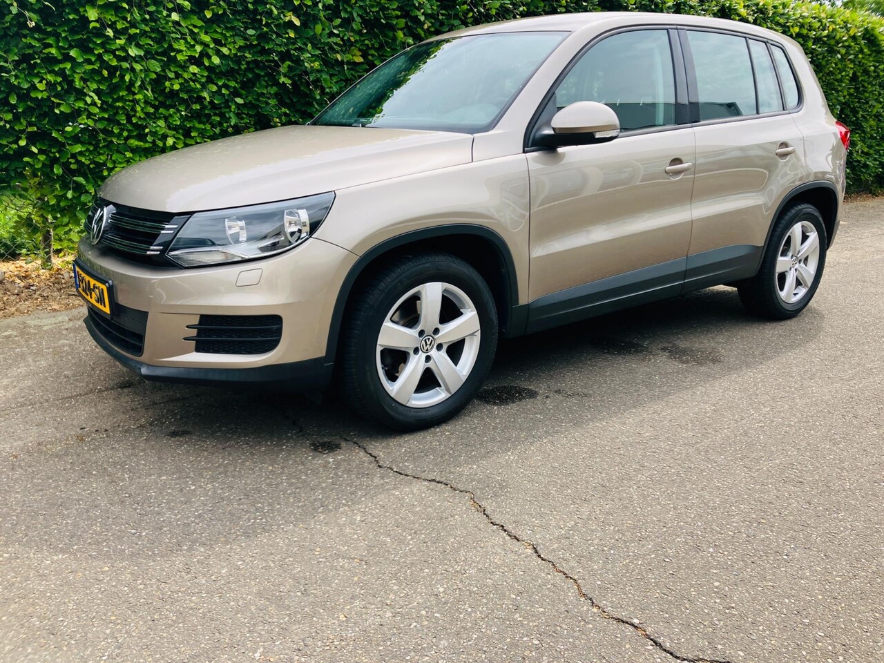 Volkswagen Tiguan - 1.4 TSI Comfort&Design Edition - AutoWereld.nl
