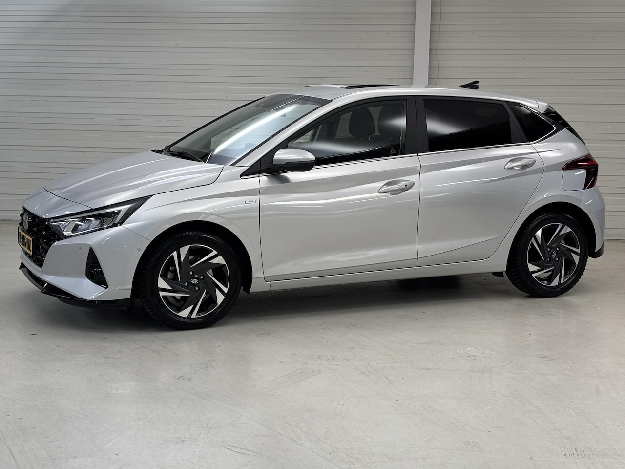 Hyundai i20 - 1.0 T-GDI Premium Sky / Schuif/Kanteldak / Navigatie + Apple Carplay/Android Auto / Bose / - AutoWereld.nl