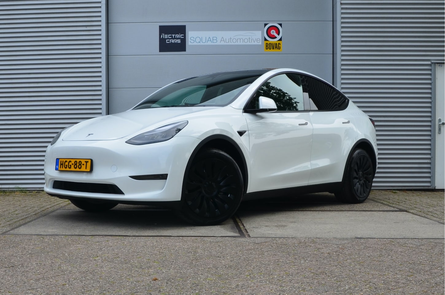 Tesla Model Y - Long Range AWD 75 kWh AutoPilot, Zwarte hemelbekleding! - AutoWereld.nl