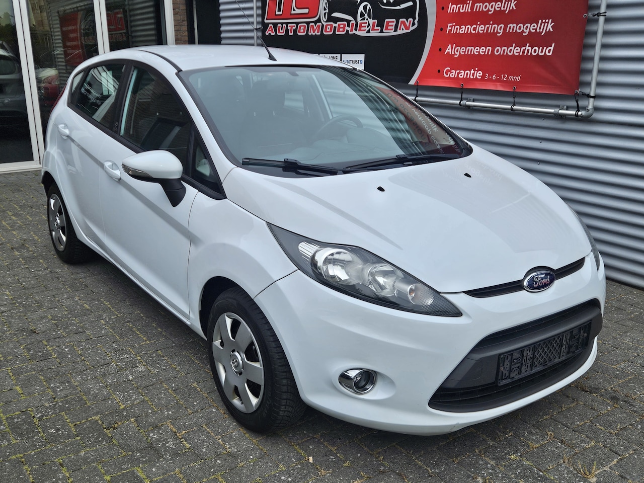 Ford Fiesta - 1.25 Champion *** CHAMPION UITVOERING AIRCO-ELECTR.RAMEN-CV-STOELVERWARMING,etc,etc.*** - AutoWereld.nl