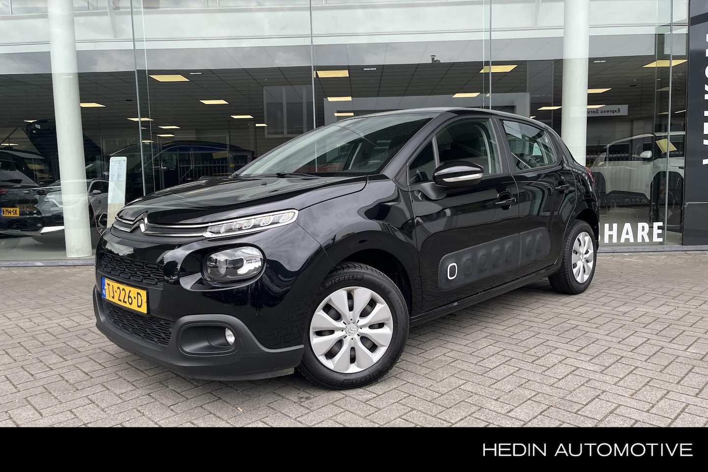 Citroën C3 - 1.2 PureTech S&S Feel Nav | Climate Control | Bluetooth | Cruise Control - AutoWereld.nl