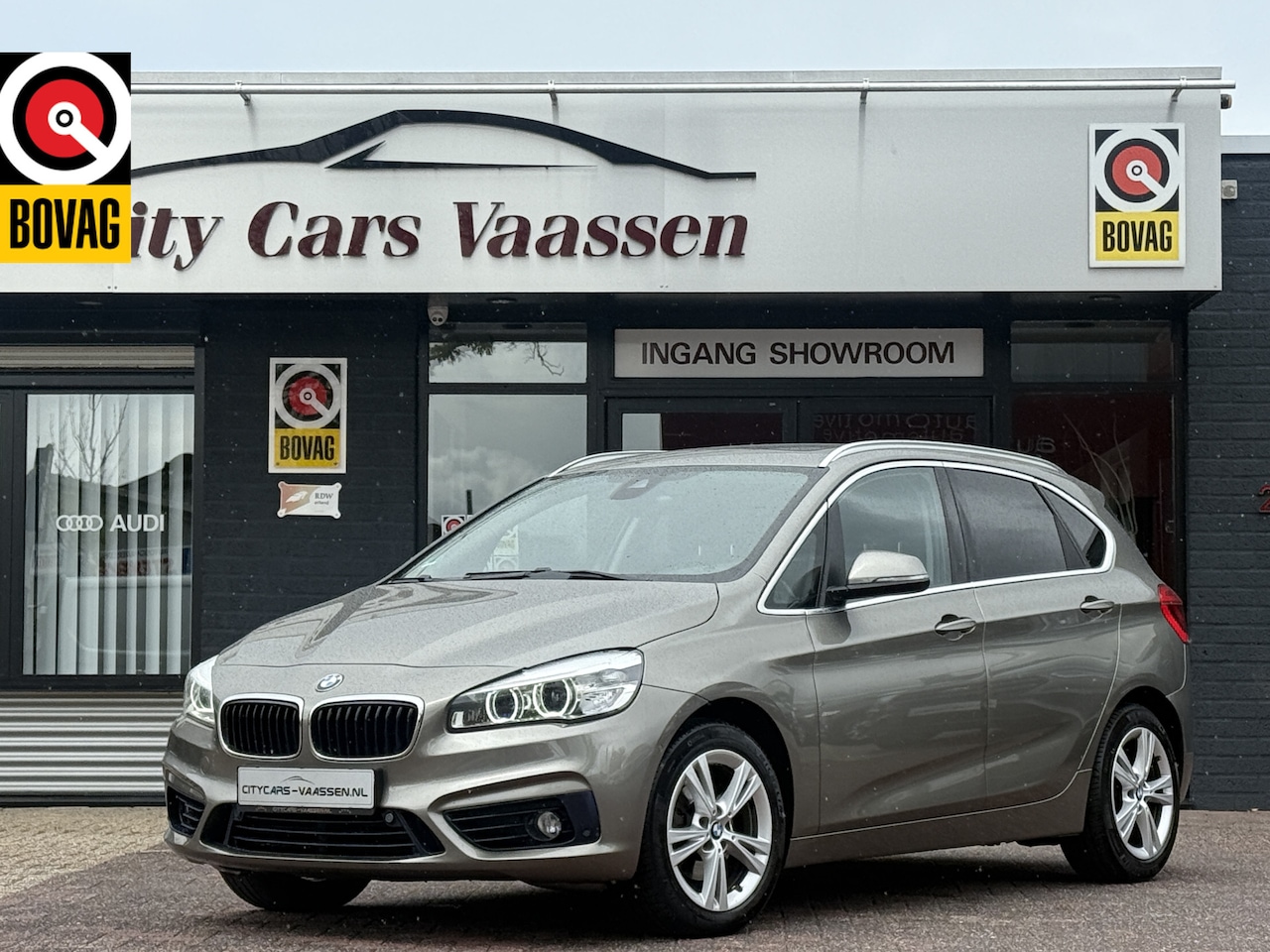 BMW 2-serie Active Tourer - 218d High Executive automaat 150 pk panoramadak navigatie climate ctr cruise ctr afn trekh - AutoWereld.nl