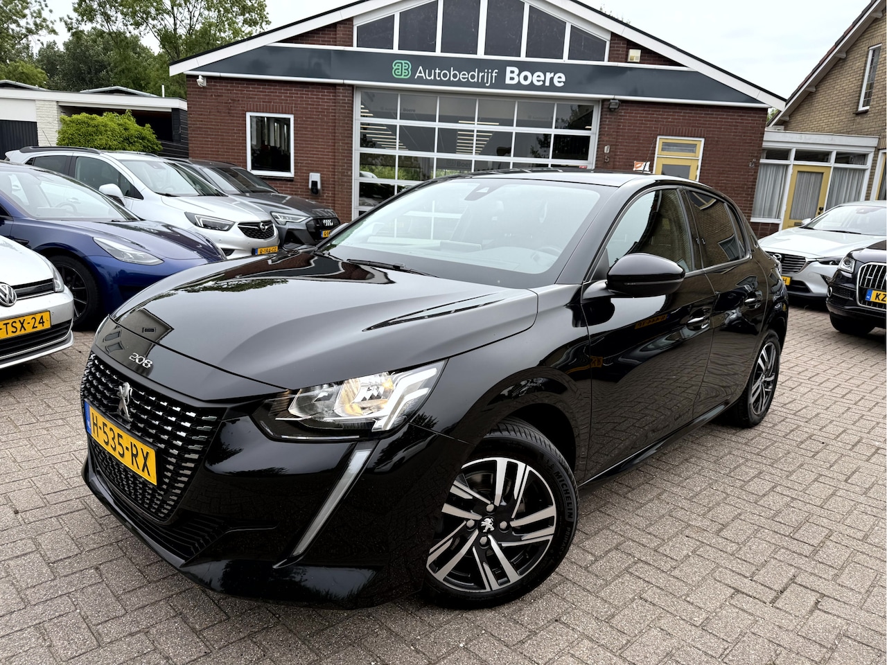 Peugeot 208 - 1.5 BlueHDi Allure Panoramadak, Camera, App Connect - AutoWereld.nl