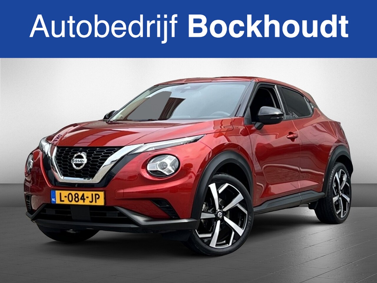 Nissan Juke - 1.0 DIG-T Acenta | Camera | Cruise | Apple Carplay - AutoWereld.nl