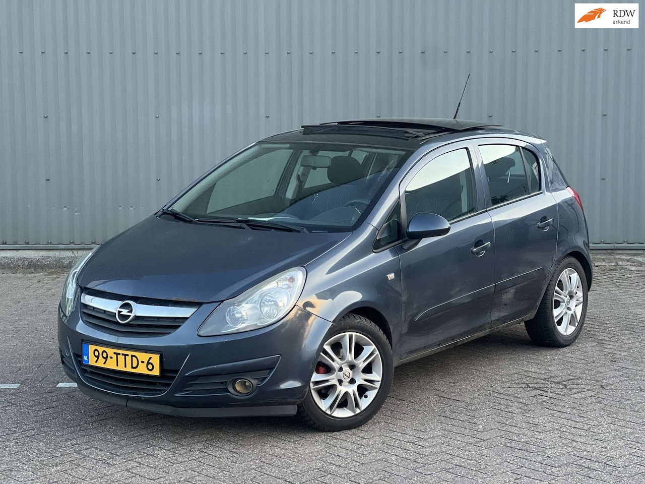 Opel Corsa - 1.2 I Panoramadak I Essentia - AutoWereld.nl
