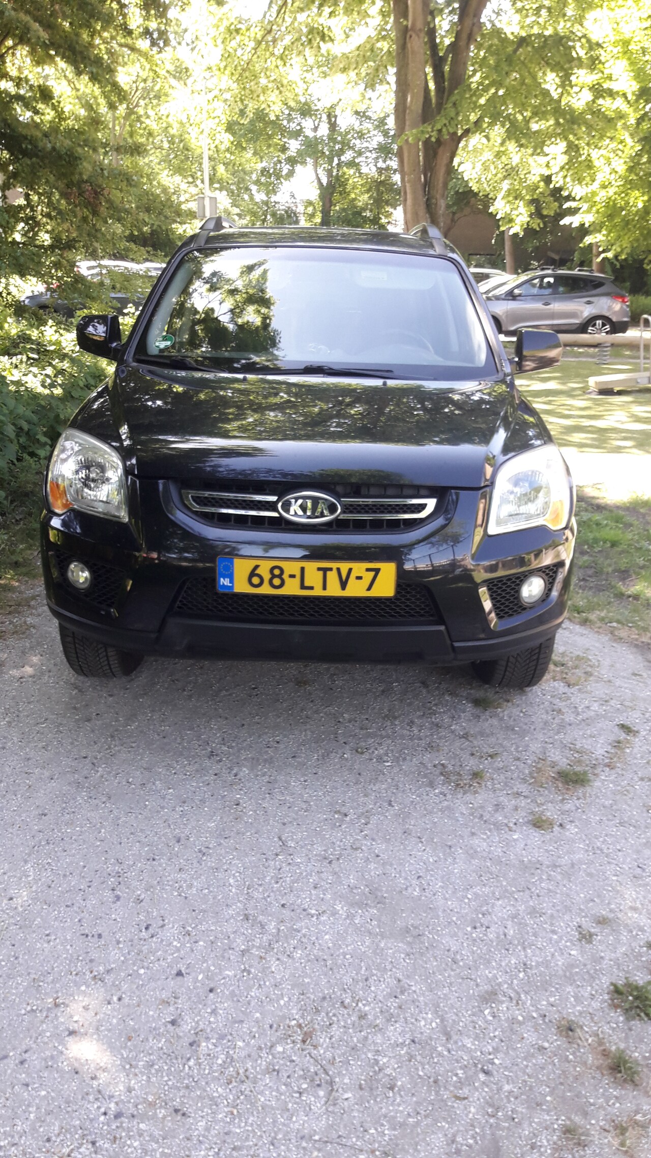 Kia Sportage - 2.0 CVVT X-ecutive - AutoWereld.nl