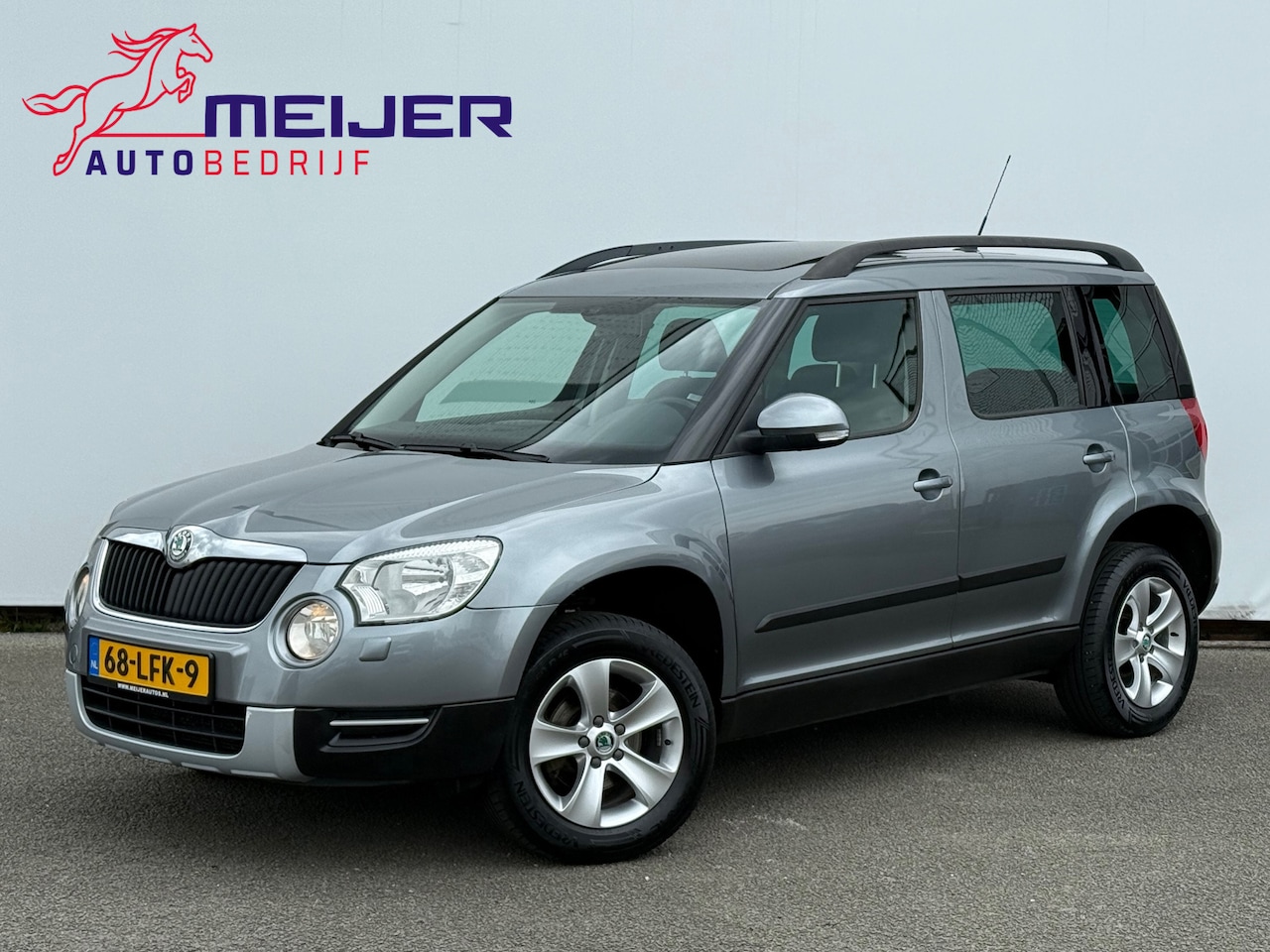 Skoda Yeti - 1.2 TSI Ambition Dakrails | Sportvelgen | Panoramadak | Cruise | Clima | Navigatie | Trekh - AutoWereld.nl