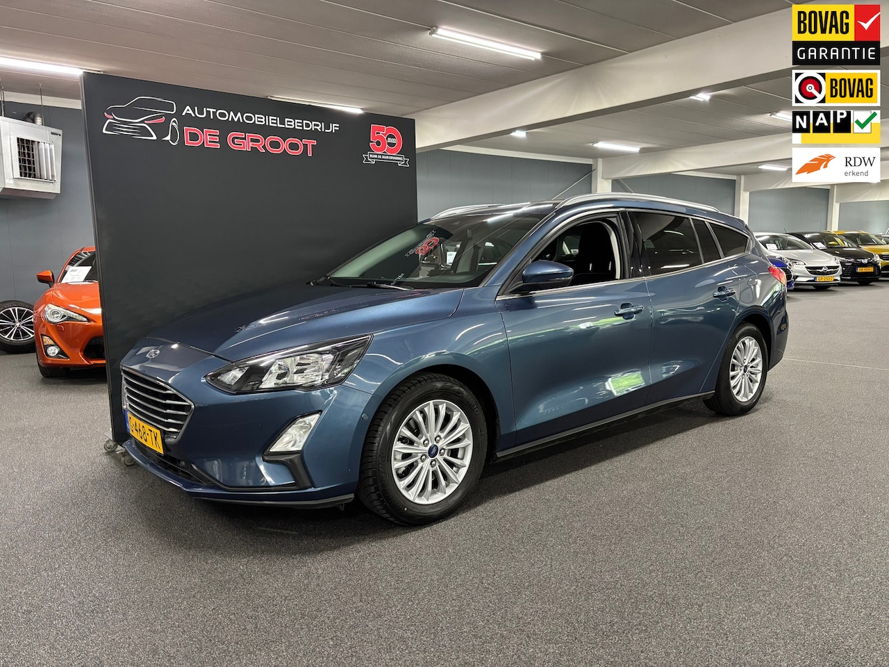 Ford Focus Wagon - 1.5 EcoBoost Titanium Business / NL-auto, Navi, Airco, Trekhaak, Camera - AutoWereld.nl