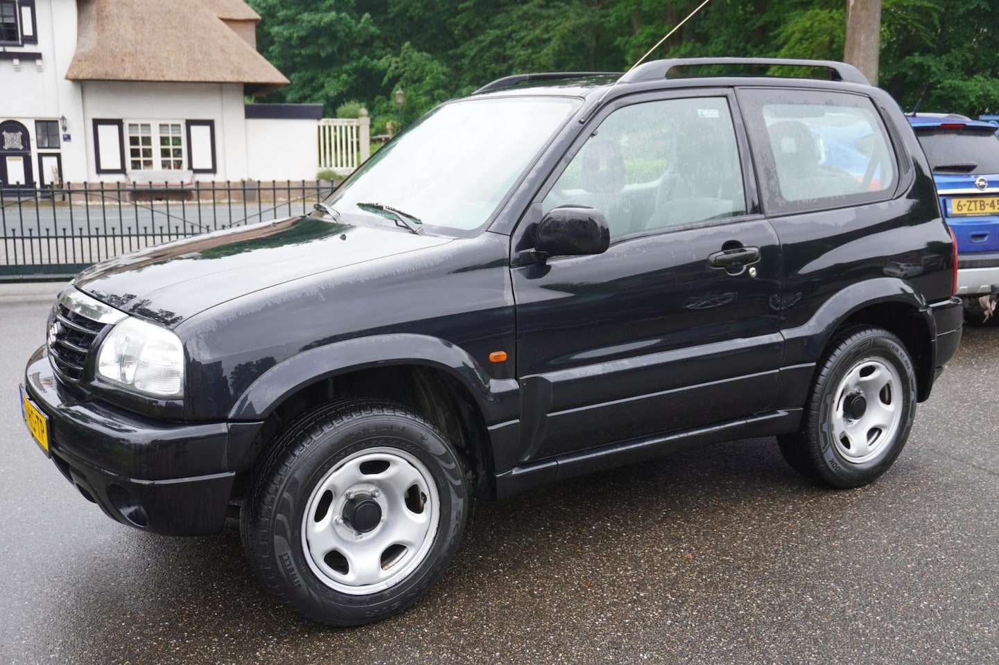 Suzuki Grand Vitara - 1.6 Metal Top Wide Body 1.6 Metal Top Wide Body - AutoWereld.nl