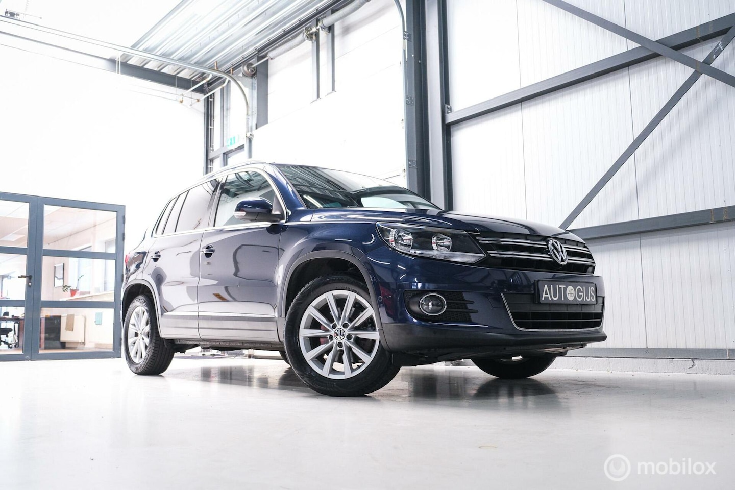 Volkswagen Tiguan - 1.4 TSI Sport&Style | Trekhaak | Apple CarPlay | NL auto NAP | Alcantara | Cruise | Climat - AutoWereld.nl