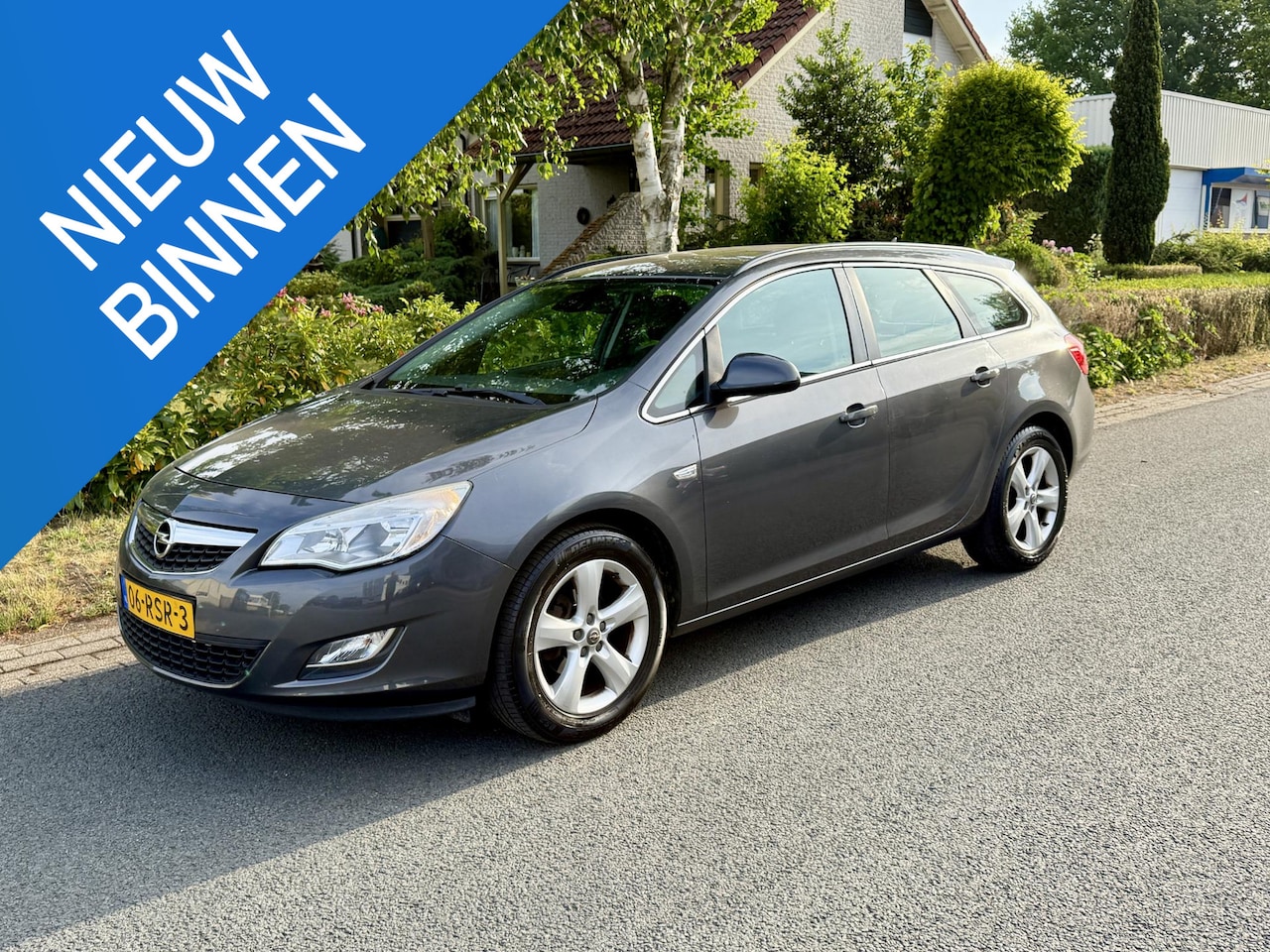 Opel Astra Sports Tourer - 1.4 16v 100PK Navi•Airco•Trekhaak - AutoWereld.nl