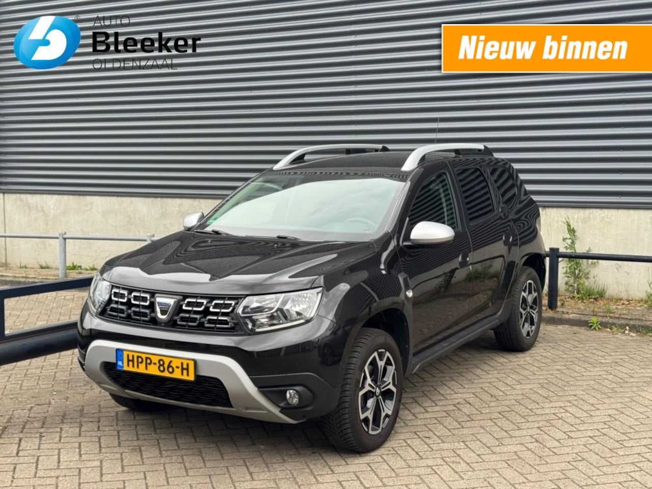 Dacia Duster - 1.3 TCe Ser.Lim.15th 360 camera Clima Cruise Trekhaak Keyless - AutoWereld.nl