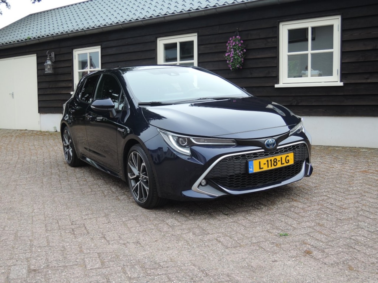 Toyota Corolla - 2.0 Hybrid Executive 2.0 HYBRID EXECUTIVE - AutoWereld.nl