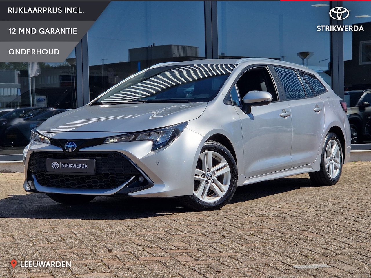 Toyota Corolla Touring Sports - 1.8 Hybrid Active Limited Parkeersensoren Navigatie - AutoWereld.nl