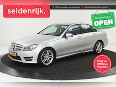 Mercedes-Benz C-klasse - 180 AMG Sport | Stoelverwarming | Xenon | Half leder | Navigatie | Climate control | Park