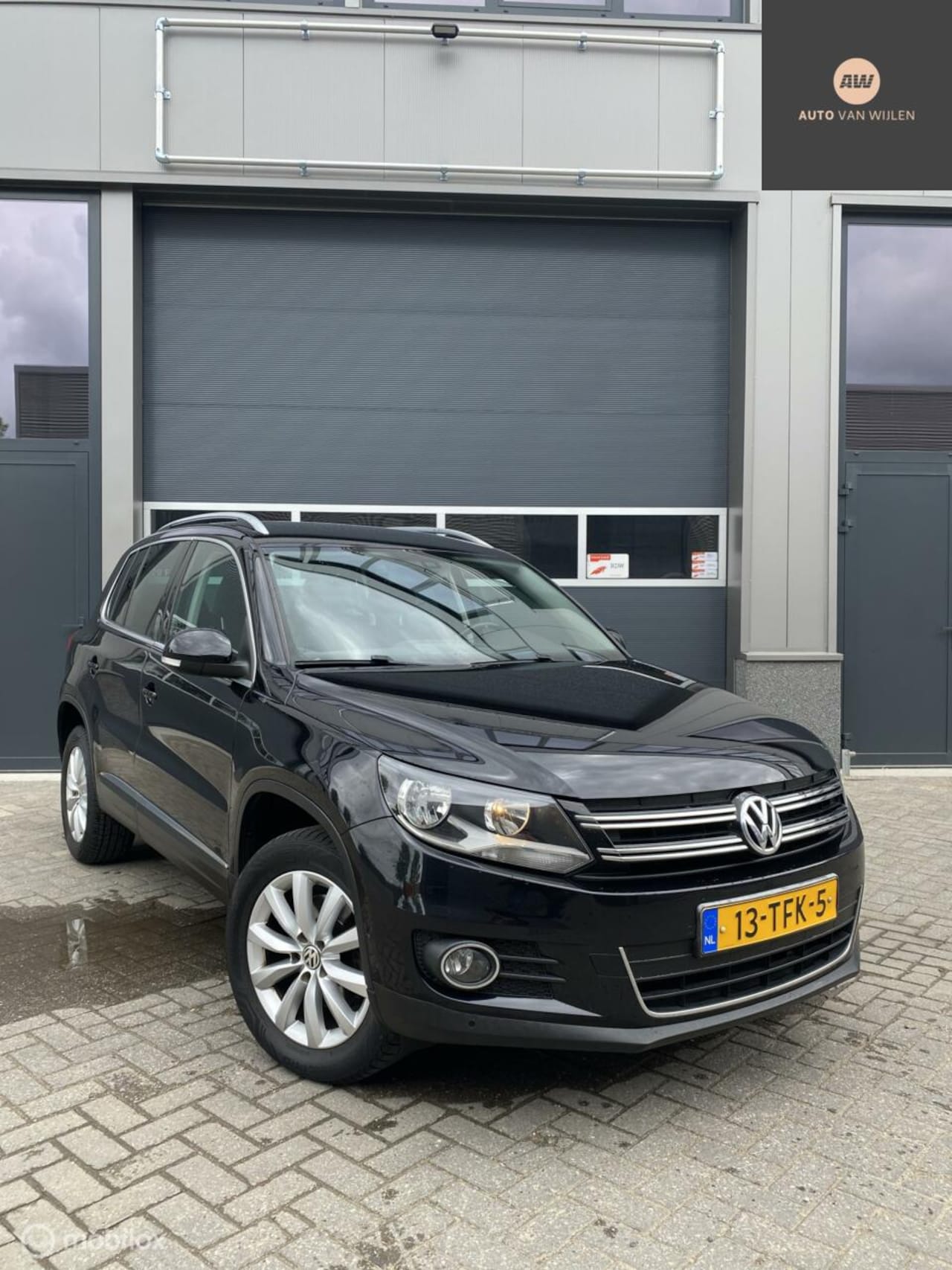 Volkswagen Tiguan - 1.4 TSI Airco/trekH/Navi/parkeersensorenVA - AutoWereld.nl