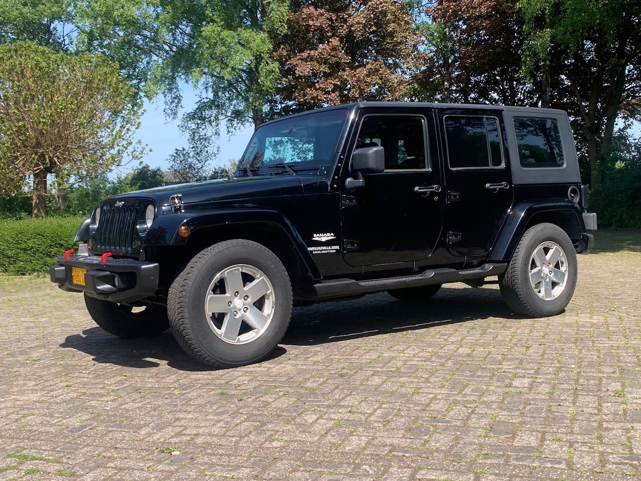 Jeep Wrangler Unlimited - JK YOUNGTIMER 7 STUKS 3.8 Sahara benzine - AutoWereld.nl
