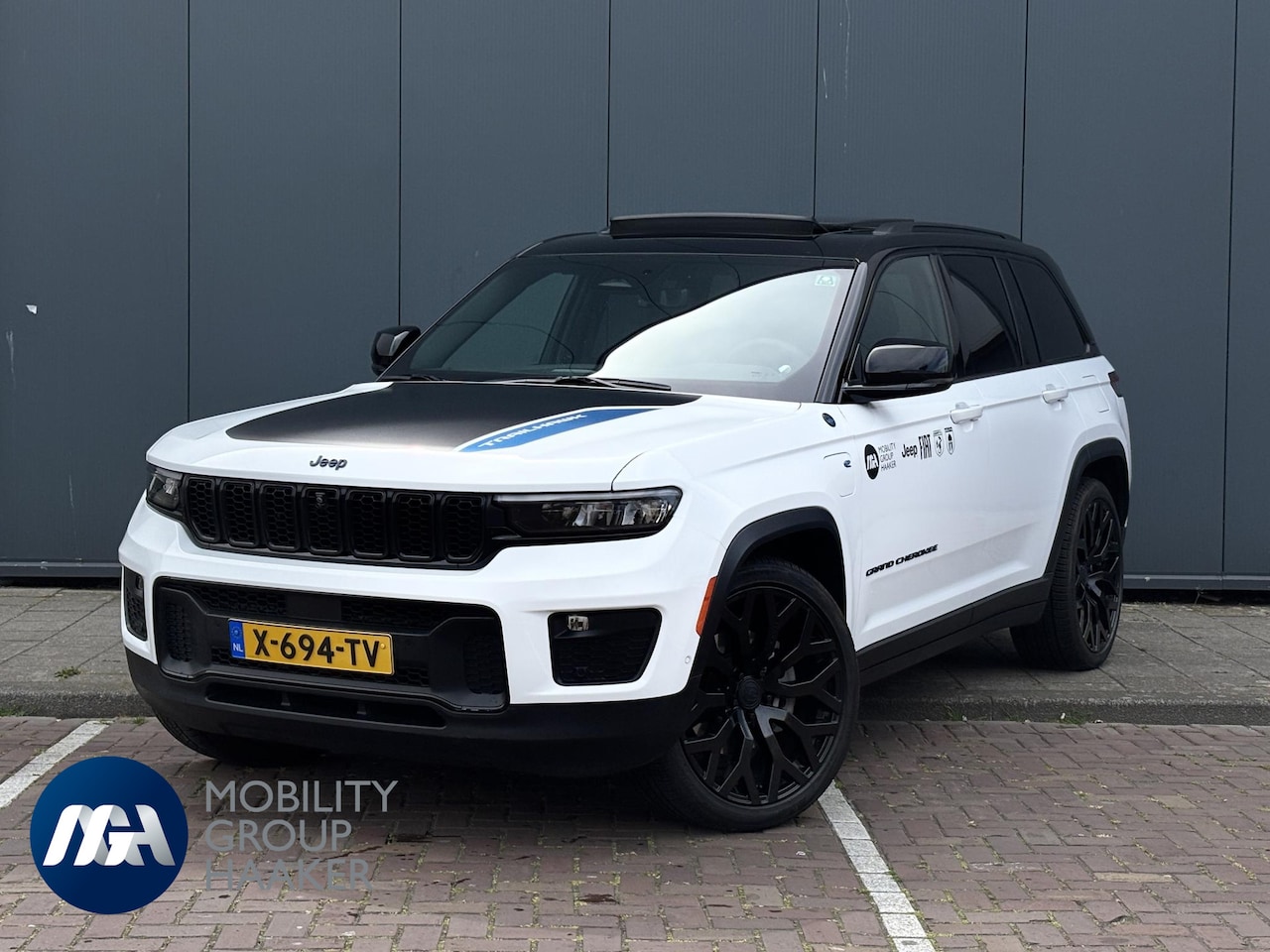 Jeep Grand Cherokee - Trailhawk 4xe Plug-in Hybrid / 22" BRUTE velgen / Apple carplay/Andriod auto I Navigatie I - AutoWereld.nl