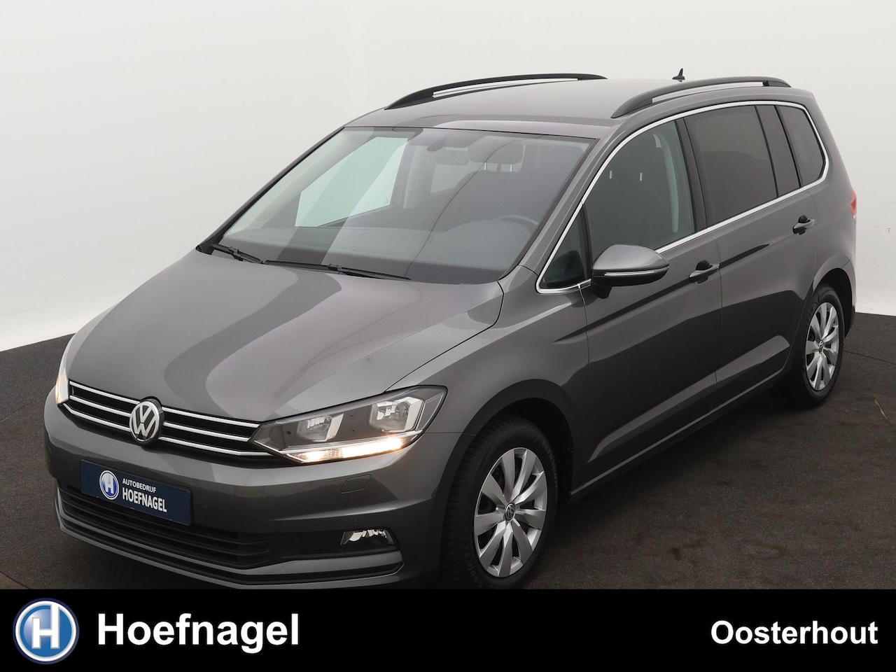 Volkswagen Touran - 1.4 TSI Comfortline 7p Automaat | Stoelverwarming | Trekhaak | Parkeersensoren | Climate C - AutoWereld.nl