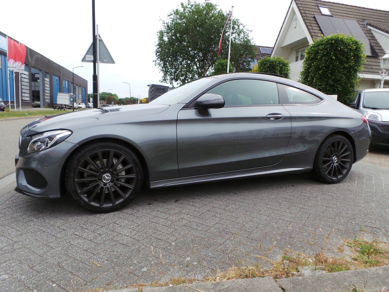 Mercedes-Benz C-klasse Coupé - 180 Pano | AMG-Line | Burmester Airco,Cruise,Navi,Stoelverw,19" Lmv ,NAP,Enz op afspraak t - AutoWereld.nl