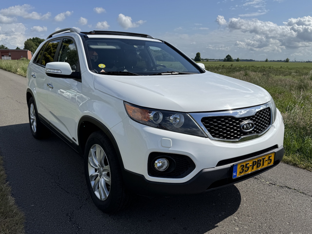 Kia Sorento - 2.2 CRDi X-clusive 4WD 7p. AUTOMAAT/PANO/ECC/LEER/XENON - AutoWereld.nl