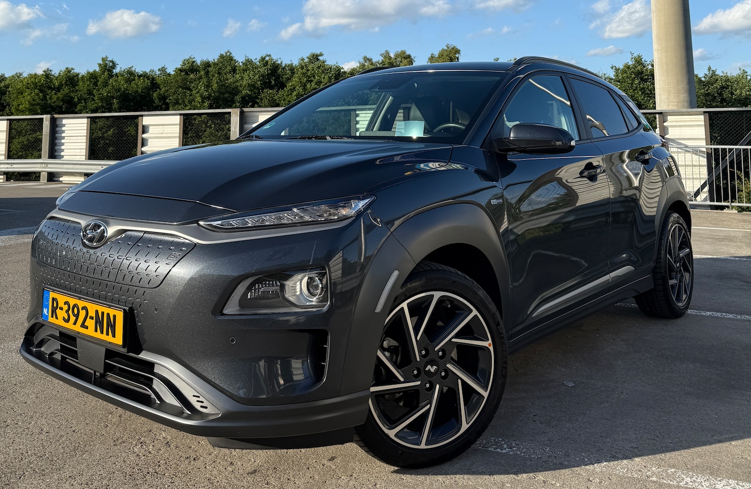 Hyundai Kona - EV Premium 64 kWh Premium, 99% SOH, Dealer Onderhoud, Garantie, Lederen bekleding, HeadUP - AutoWereld.nl