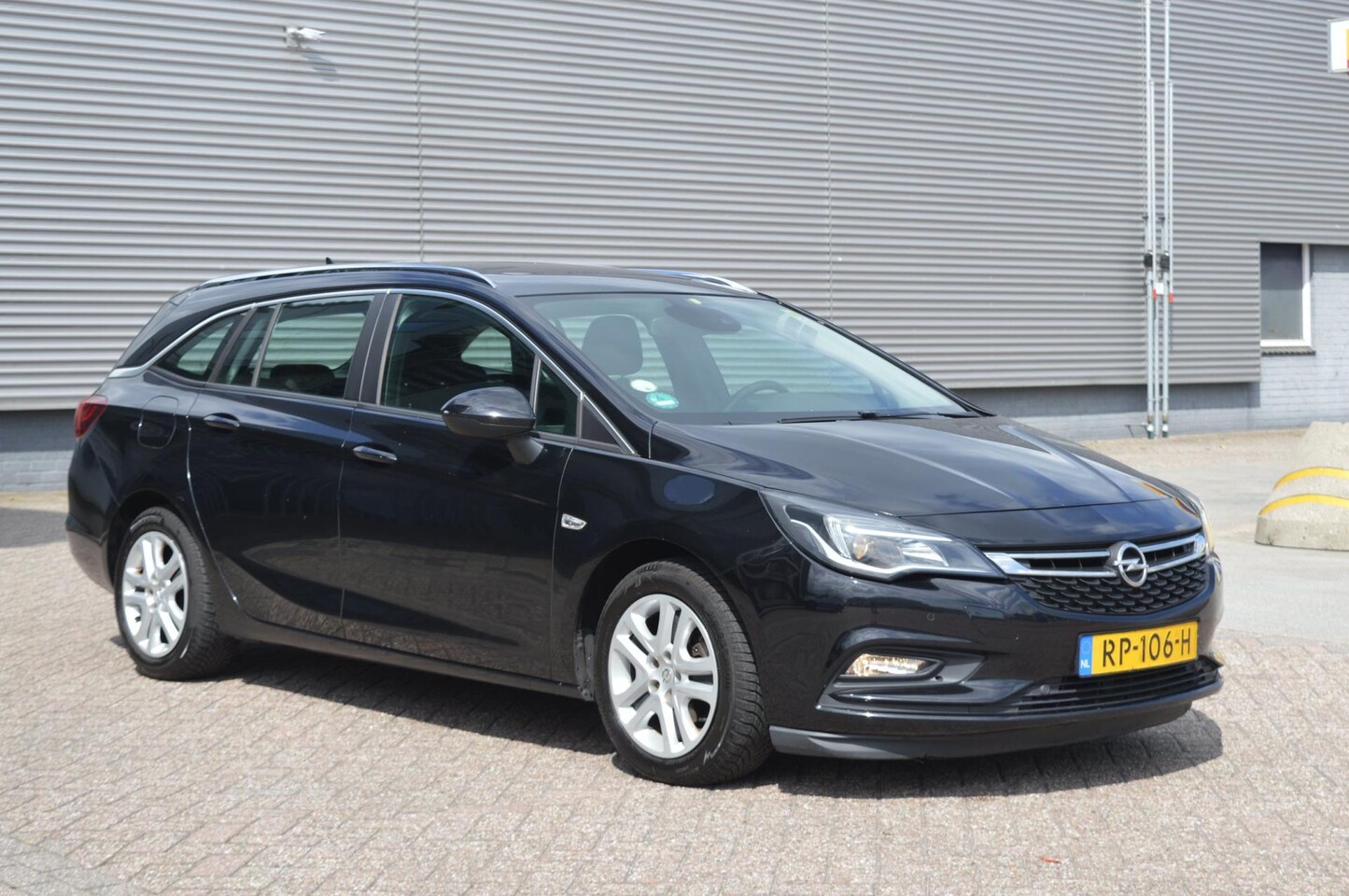Opel Astra Sports Tourer - 1.6 CDTI Business+ bj18 navi cruise voll pakket - AutoWereld.nl