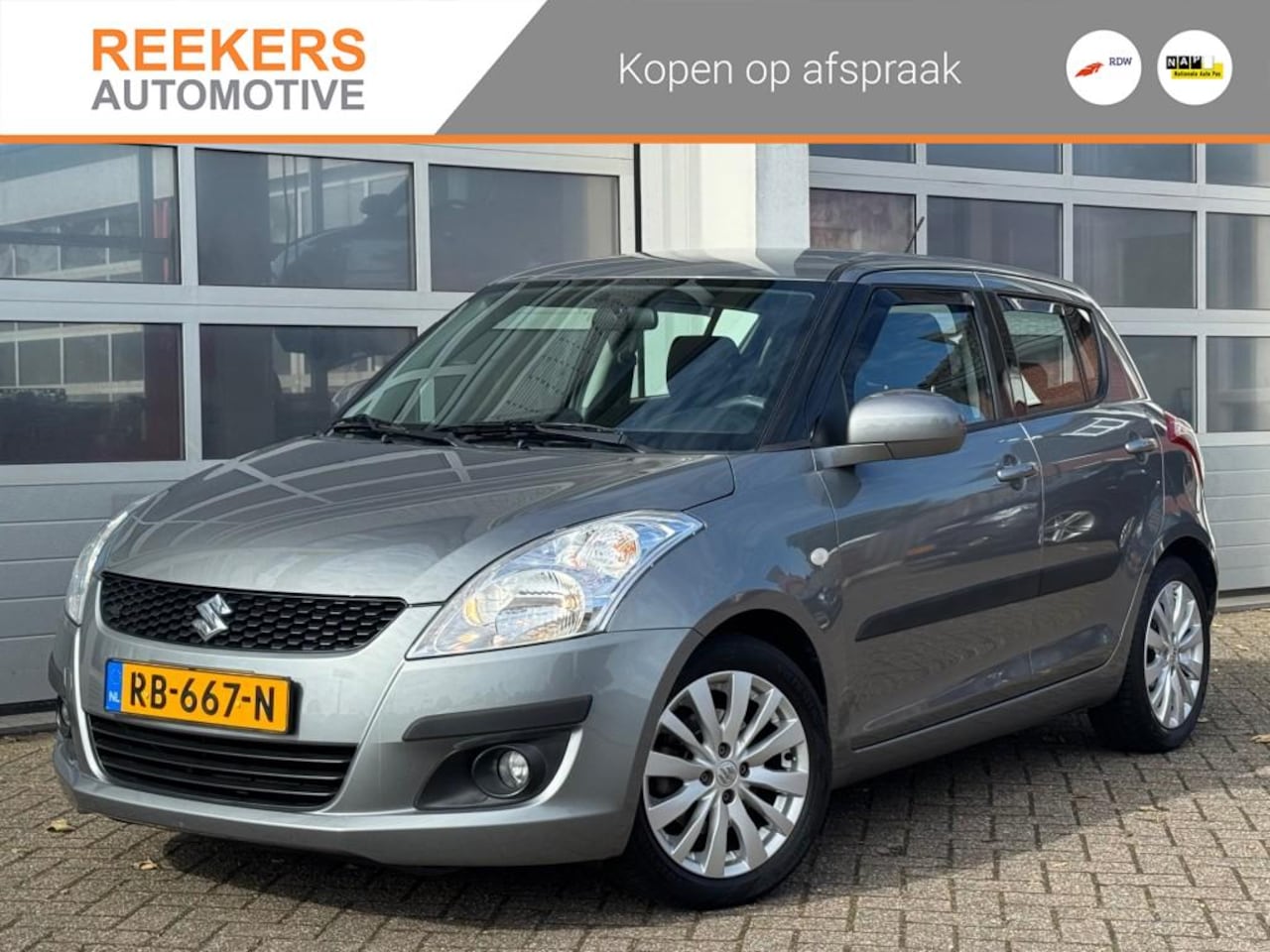Suzuki Swift - 1.2 EXCLUSIVE navi cam trekhaak stoel verw. - AutoWereld.nl