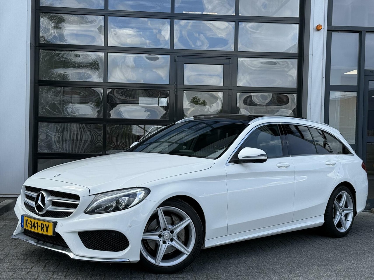 Mercedes-Benz C-klasse Estate - 180 AMG Sport AUT / PANO / 360 /LED - AutoWereld.nl