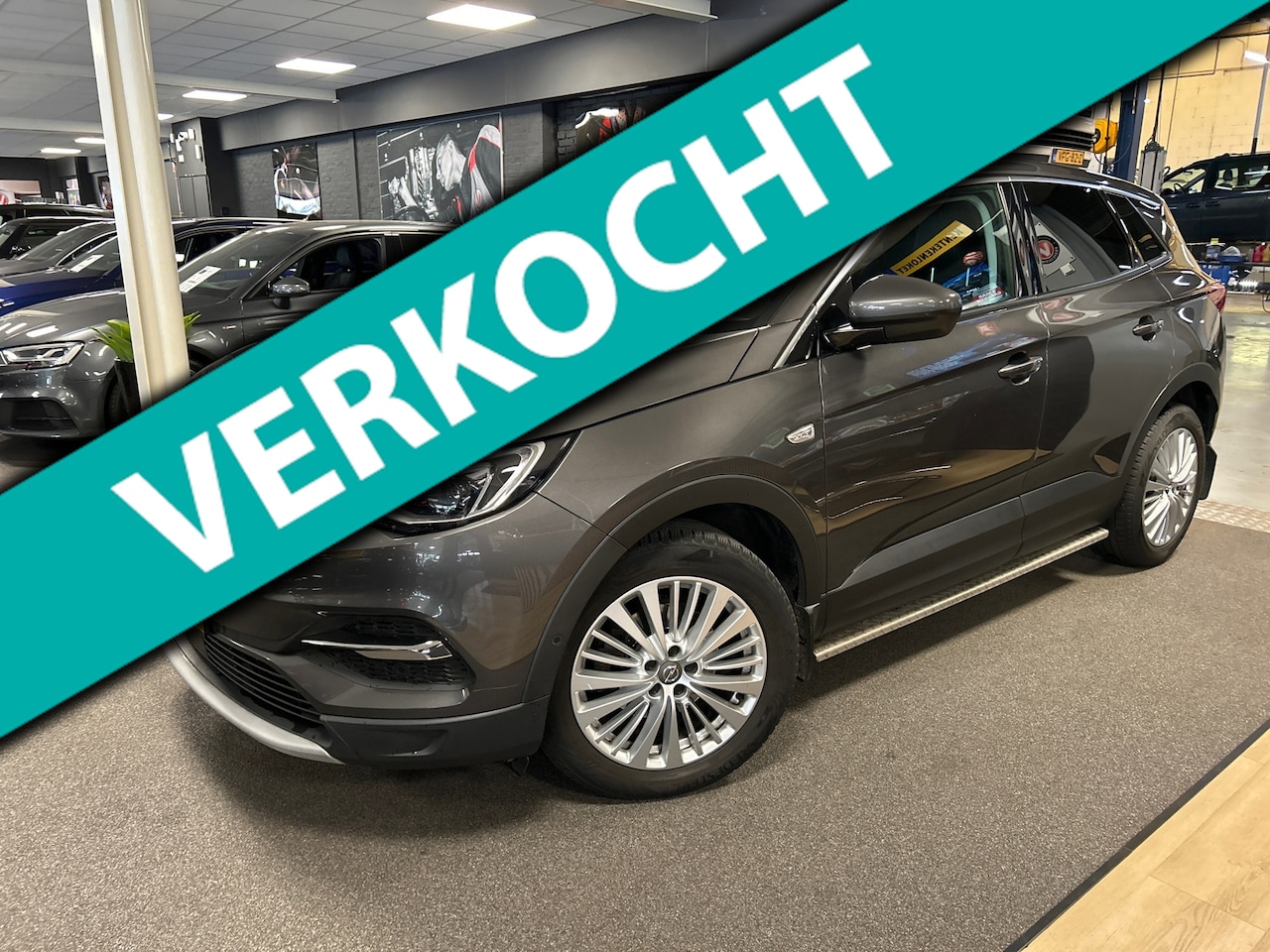 Opel Grandland X - 1.2 Turbo Ultimate/navi/camera/trekhaak/stoelverw/apple carplay - AutoWereld.nl